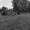 Laying out a sound barrier fence with hay bales